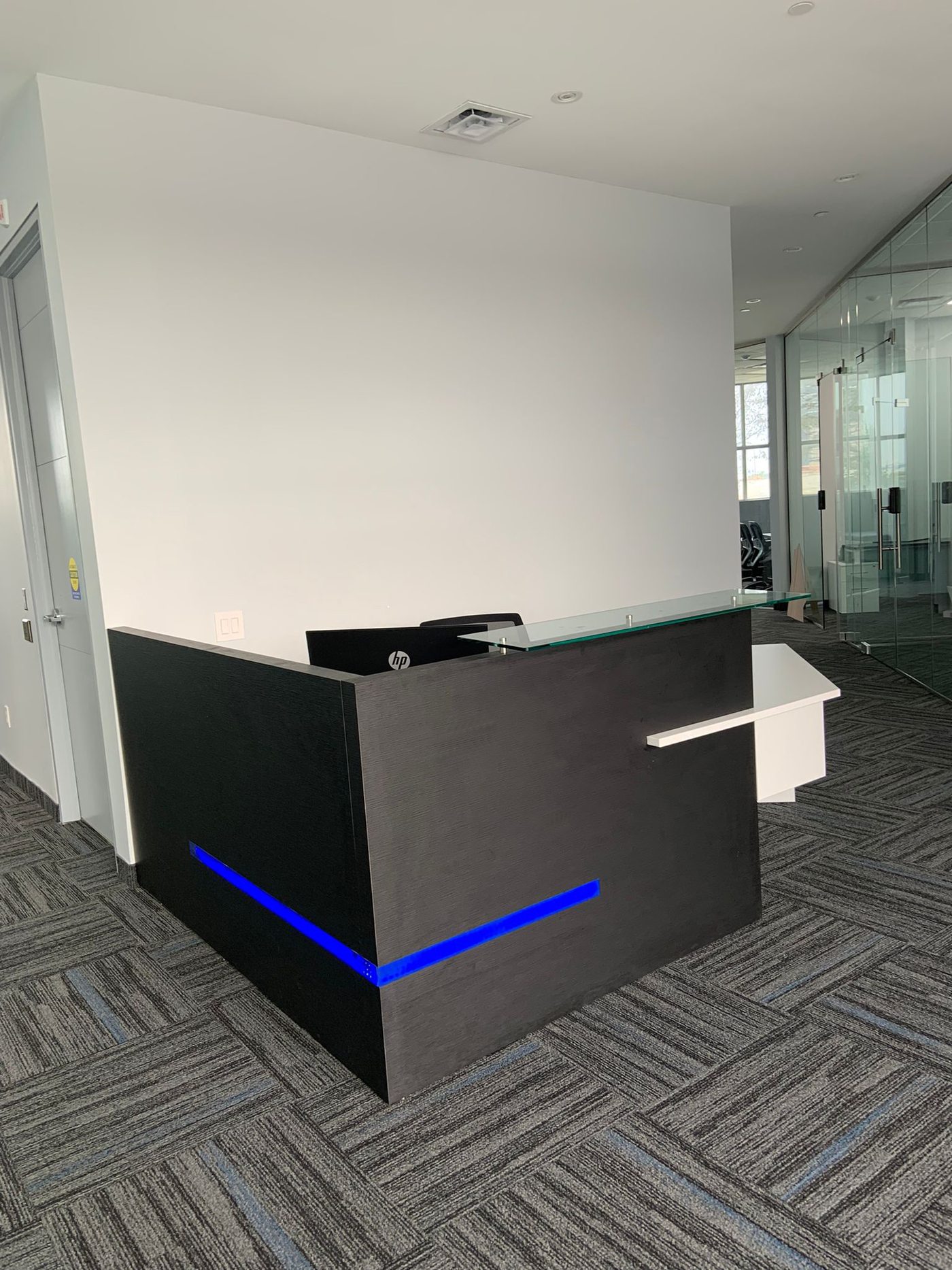 Custom reception desk built by WorkspacePlus