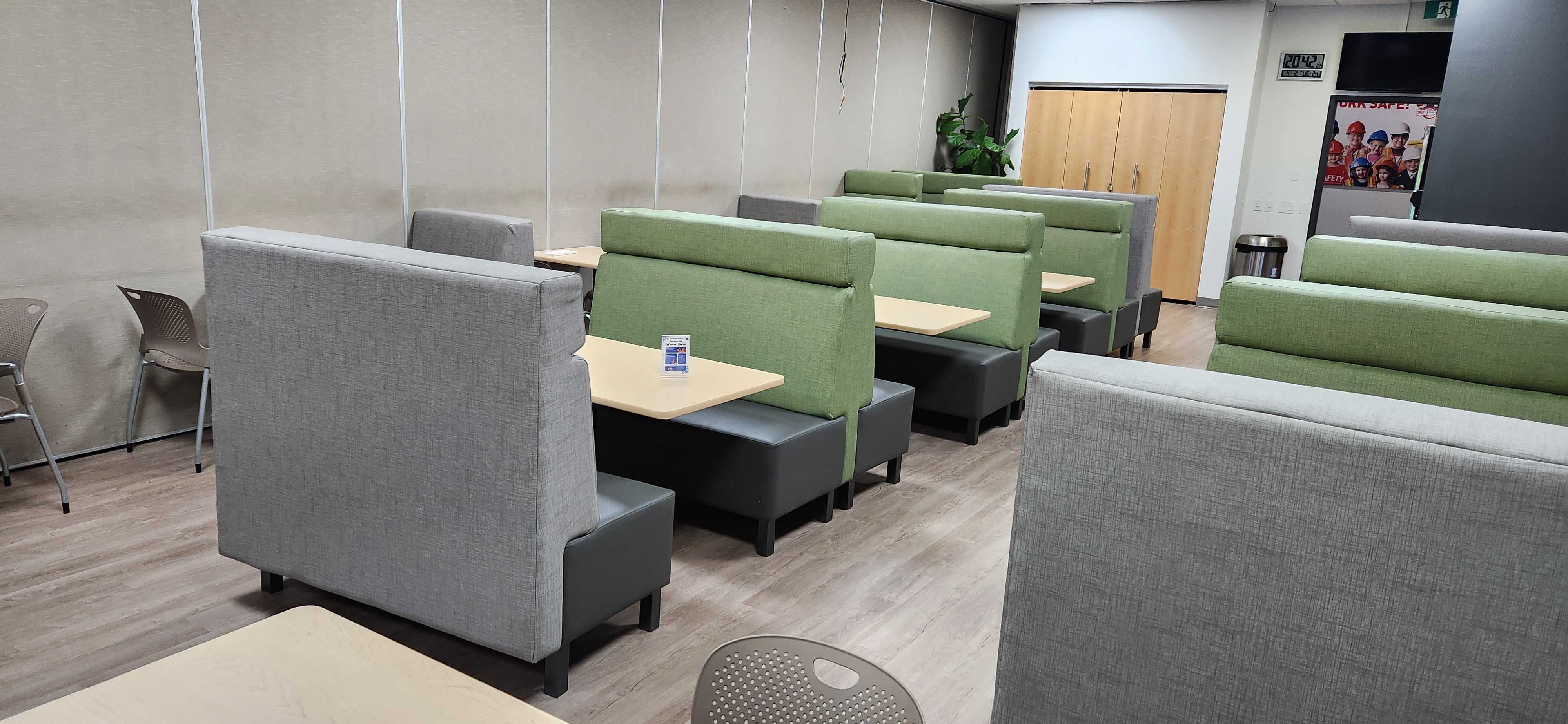 Installed booth seating and millwork by WorkspacePlus at Royal Canin
